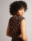 Black and Orange Geometric Cut-Out Dress